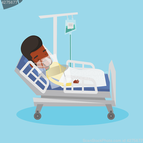 Image of Patient lying in hospital bed with oxygen mask.