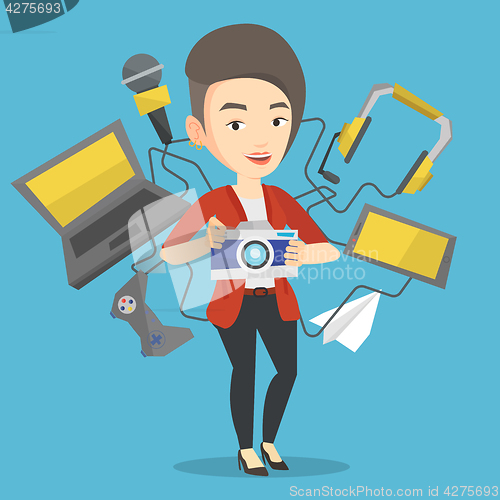 Image of Young woman surrounded with her gadgets.
