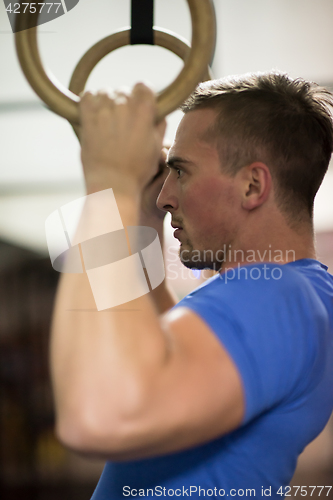 Image of man doing dipping exercise