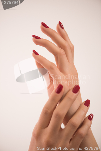 Image of closeup of hands of a young woman