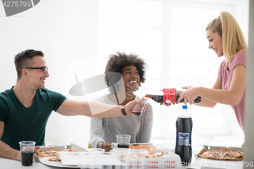 Image of multiethnic group of young people have a lunch break