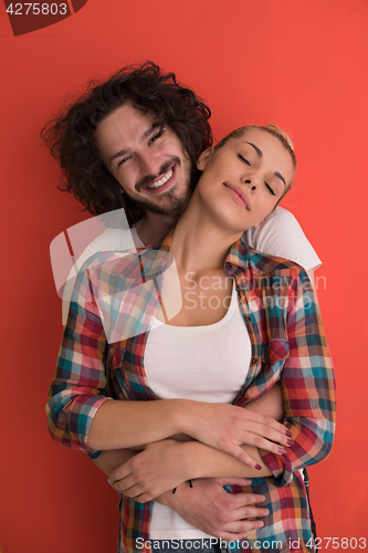 Image of couple in love  over color background