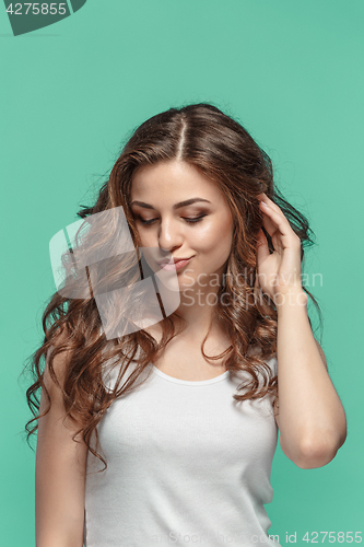 Image of The young woman\'s portrait with thoughtful emotions