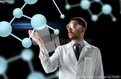 Image of scientist in lab coat and goggles with molecules