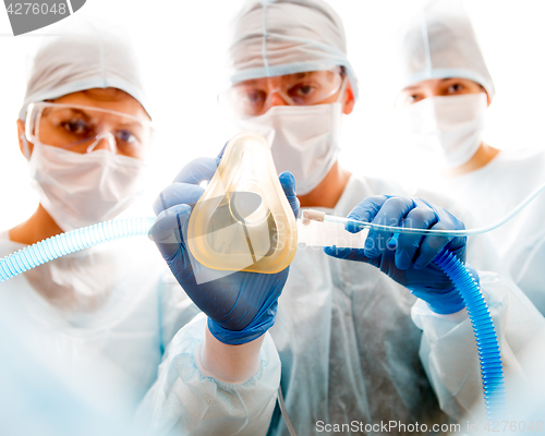 Image of Photo of surgeon with mask