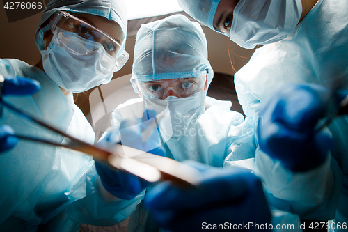 Image of Photos from below of doctors