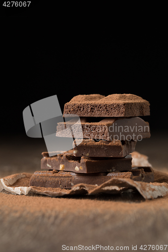 Image of Pieces of chocolate on paper