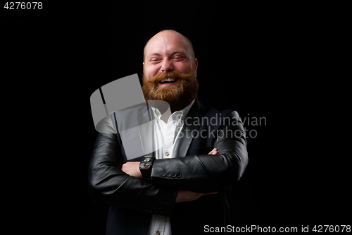 Image of Happy man with arms crossed