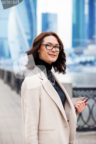 Image of fashion style. portrait of a beautiful businesswoman in a light 