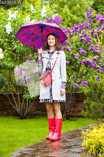 Image of woman with umbrella