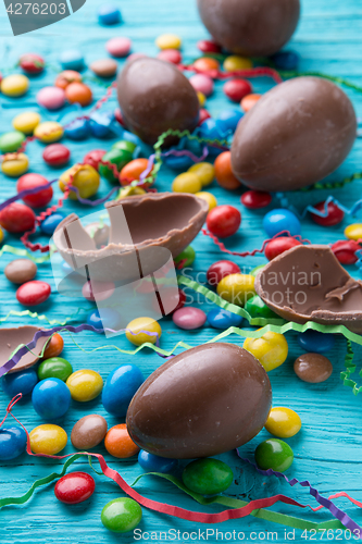 Image of Colorful candy on blue table