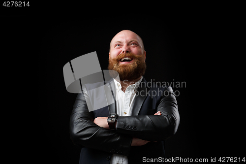 Image of Happy, smiling man looking up