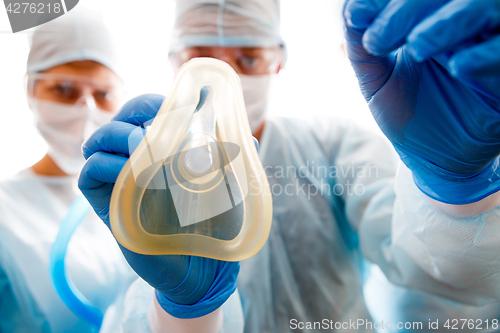 Image of Surgeon with mask for anesthetic