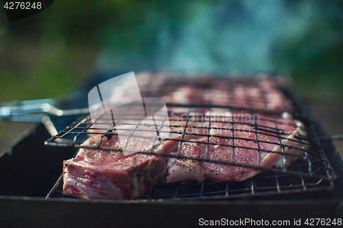 Image of Grilling fresh entrecote pork