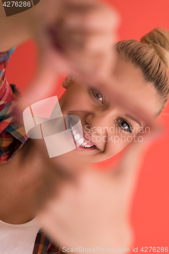 Image of young woman over color background