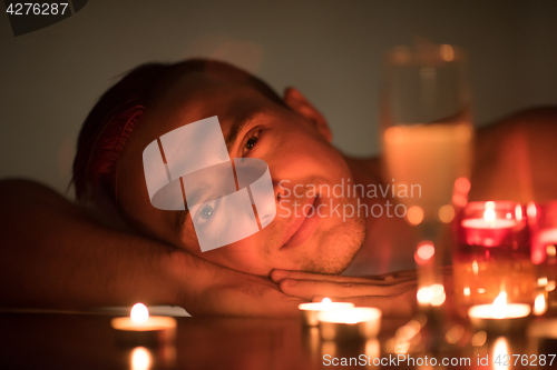 Image of man relaxing in the jacuzzi