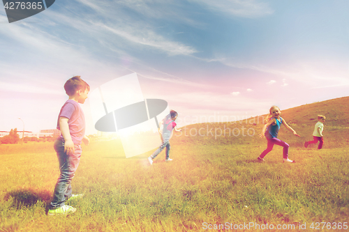 Image of group of happy kids running outdoors