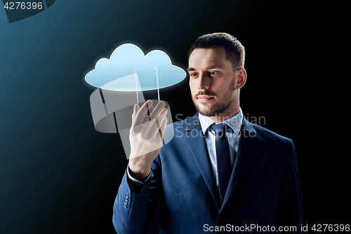 Image of businessman with transparent smartphone