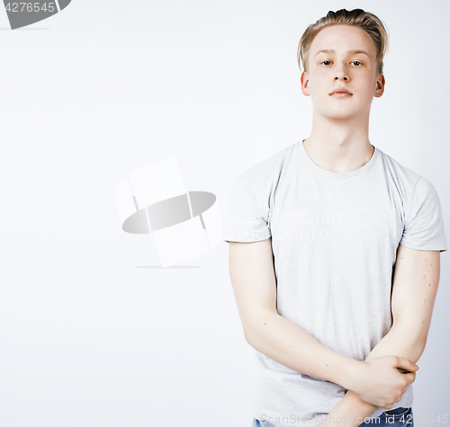 Image of young handsome teenage hipster guy posing emotional, happy smiling against white background isolated, lifestyle people concept 