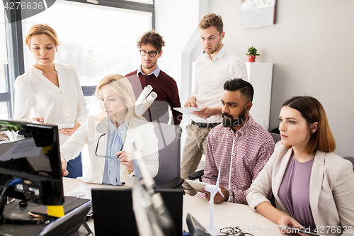 Image of business team developing renewable energy project