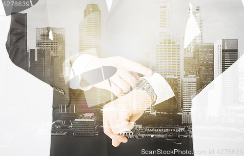 Image of close up of businessman with wristwatch