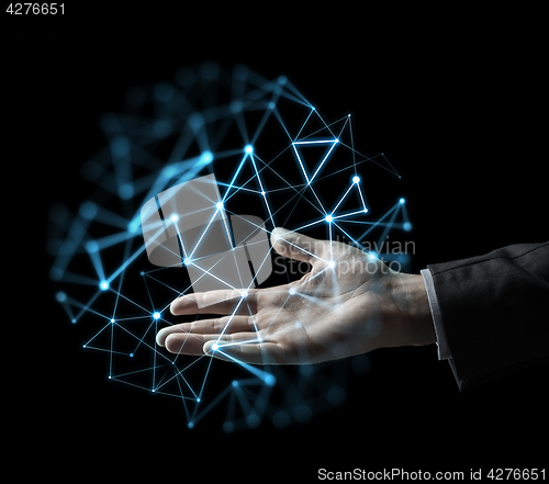 Image of businessman hand with virtual network projection