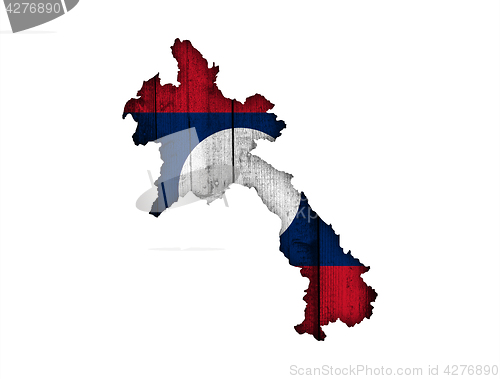 Image of Map and flag of Laos on weathered wood