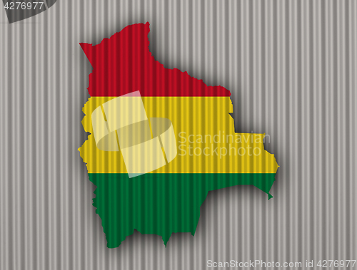 Image of Map and flag of Bolivia on corrugated iron