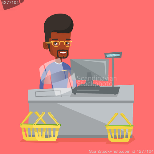 Image of Cashier standing at the checkout in supermarket.