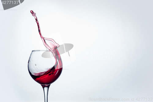 Image of The one wine glass against white