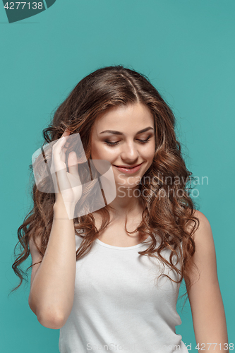 Image of The young woman\'s portrait with happy emotions