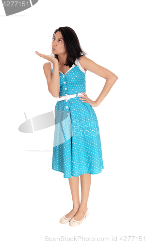 Image of Lovely woman blowing a kiss.