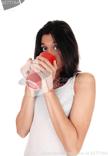 Image of Beautiful Hispanic woman with red mug.