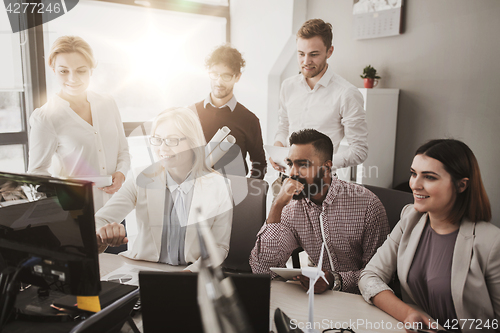 Image of business team developing renewable energy project