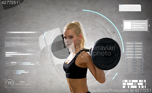 Image of young sporty woman exercising with barbell