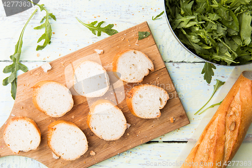 Image of Photo of cut loaf, greens