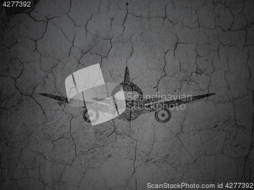 Image of Vacation concept: Aircraft on grunge wall background