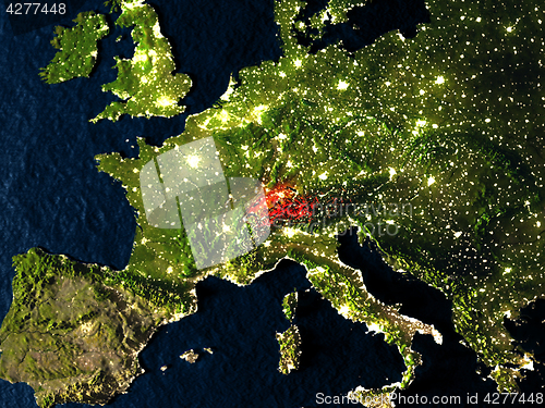 Image of Switzerland in red from space at night