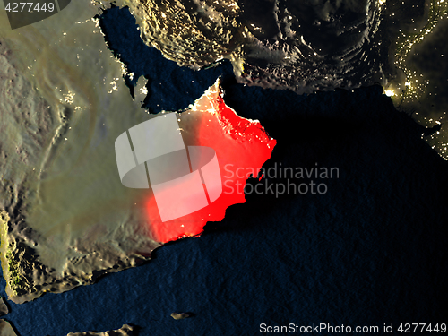 Image of Oman in red from space at night