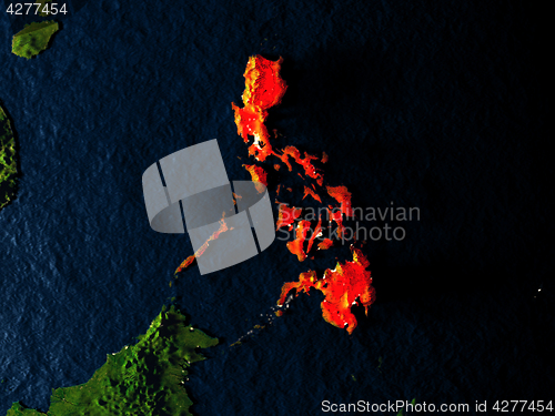 Image of Philippines in red from space at night