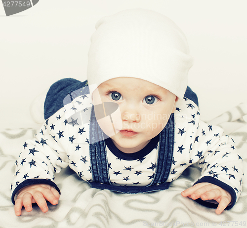 Image of little cute baby toddler on carpet isolated close up smiling adorable cheerful