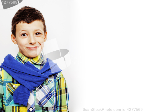 Image of little cute adorable boy posing gesturing cheerful on white background, lifestyle people concept