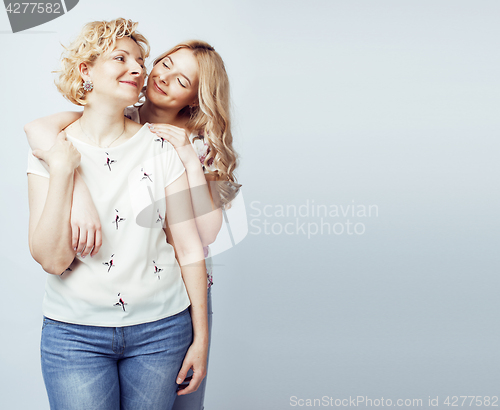 Image of mother with daughter together posing happy smiling isolated on white background with copyspace, lifestyle people concept 