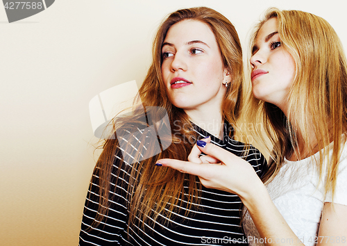 Image of best friends teenage girls together having fun, posing emotional on white background, besties happy smiling, lifestyle people concept