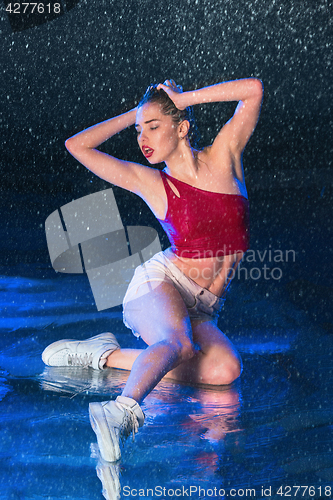 Image of Fashion girl in aqua studio