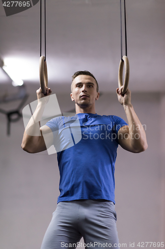 Image of man doing dipping exercise