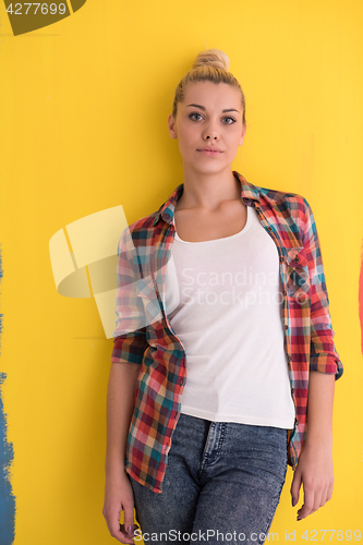 Image of young woman over color background