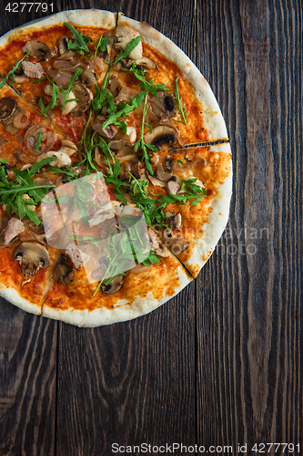 Image of Pizza with chicken and mushrooms