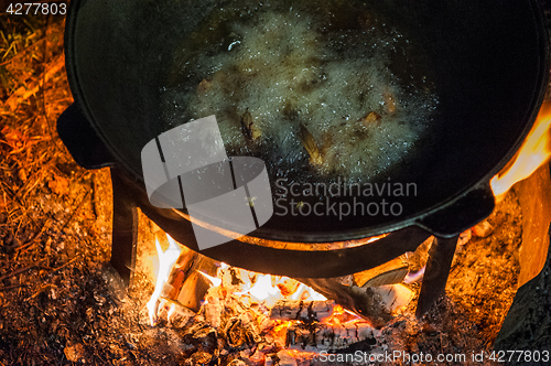 Image of Cooking over a campfire