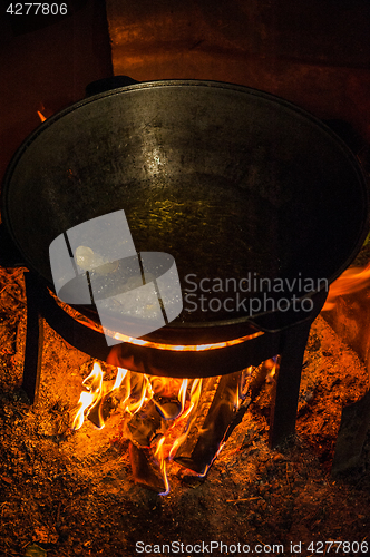 Image of Cooking over a campfire